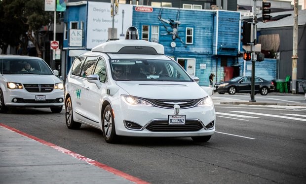 A Waymo-customized Chrysler Pacifica hybrid, used for Google’s self-driving vehicle program